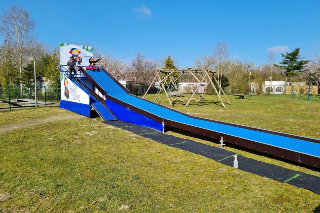 Ganzjahresrodelbahn mieten für Großveranstaltungen von eventwerk. rodeln mit Tubingbahn